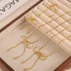 Wholesale 304 Stainless Steel Bow Knot PVD Coated Real Gold Plated IG Style Simple Style Waterproof Non Tarnish Gold Silver Earrings Necklace