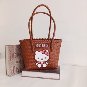 Brown shoulder basket with letter kt cat embroidery