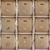Wholesale 304 Stainless Steel Copper Butterfly Vacuum Plating Zircon Gold Plated Simple Style Cuban Link Chain Curb Chain Lobster Trigger Clasp Closure Pendant Necklace