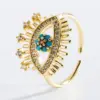 Fashion Hollow Devil's Eye Copper Plated 18k Gold Micro-inlaid Zircon Ring