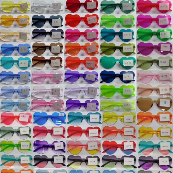Wholesale Transparent jelly color love sunglasses men's and women's peach heart sunglasses cross-border European and American heart-shaped conjoined sunglasses