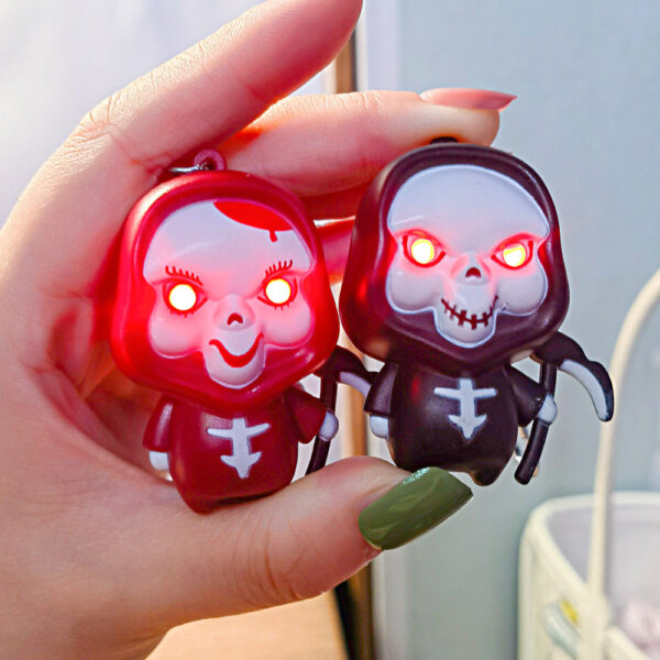 Wholesale Death glowing sound horror Ghost April Fool's Day creative car keychain schoolbag pendant couple small gift