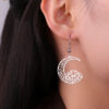 Wholesale European and American Holiday Cross-Border Decoration Cut Out Moon Lotus Earrings 304 Stainless Steel Earrings