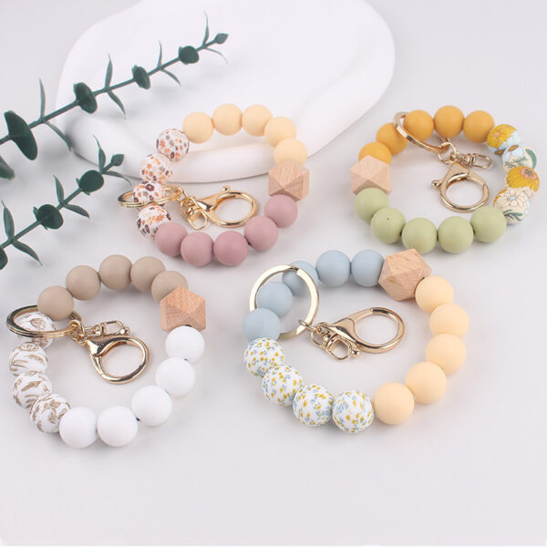 Wholesale In-Stock Temu Silicone Bead Bracelet Beech Wood Octagonal Print Silicone Wrist Keychain Pendant Bracelet