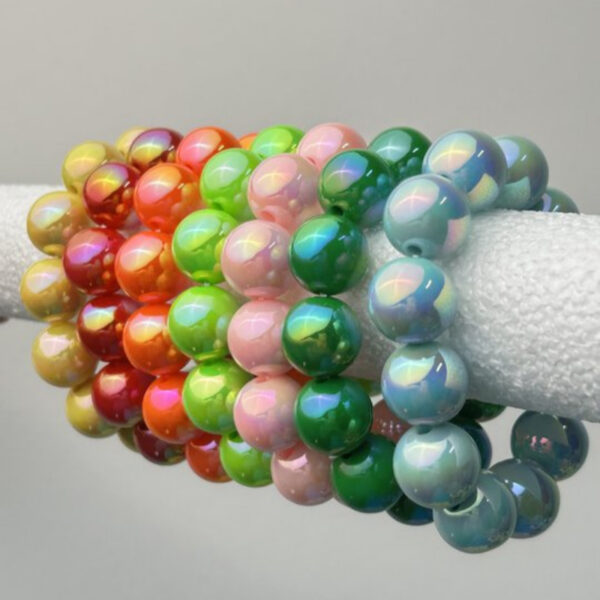 oly-2e05966f10fc9bac6784a045d7313c1a Wholesale Color-blocked laser beaded resin bracelet