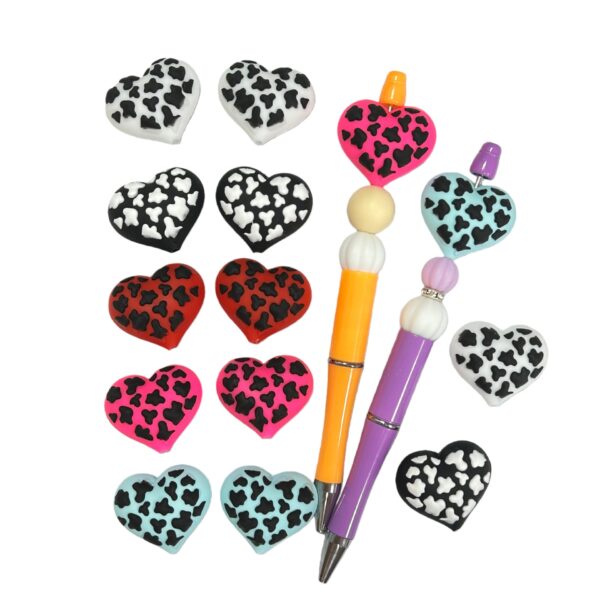 oly-2f619a4f3f863c6f658b71005c52af8e Wholesale Silicone heart-shaped leopard print beads, epoxy resin 3D card beads