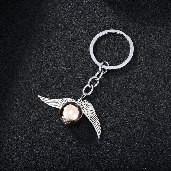 Wholesale European and American Cross-Border Hot Selling Fashion Deathly Saints Golden Snitch Keychain Fashion Alloy Car Key Chain Pendant