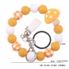 Wholesale New wrist keychain pendant leather PU short tassel mushroom silicone beaded bracelet key ring accessories