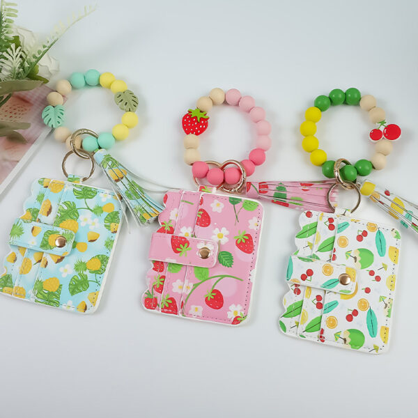 oly-30a93f6e5b841be5f0ac666b10cdb44e Wholesale Fruit Print Pu Card Holder Silicone Beaded Keychain Silicone Bead Bracelet