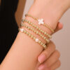 Wholesale Jewelry Niche Design Sense Cross Bracelet suit Sweet Cool Beaded Shell Pearl Bracelet