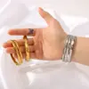Wholesale 304 Stainless Steel Round Oval PVD Coated 18K Gold 18K Real Gold Plated Real Gold Plated Simple Style Waterproof Non Tarnish Polishing Gold Silver Bangle