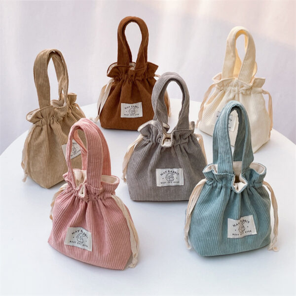oly-32e4b2b916666404ccedd304573b8ec8 Wholesale MAY RABBIT corduroy awstring bag large capacity handbag storage bag canvas bag with hand gift awstring bag fashion