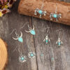 oly-333ec265b16abc2fedc8f3dd6f6a220e Wholesale New Retro Alloy Blue Turquoise Horn Earrings European and American Western Cowboy Creative Bull Head Earrings