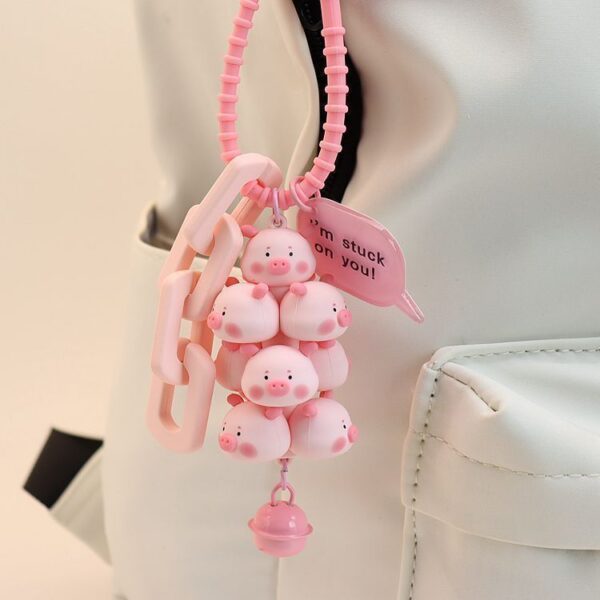 Wholesale Cute pet stacked pig cartoon doll creative anti-lost keychain student schoolbag pendant couples wholesale small gifts