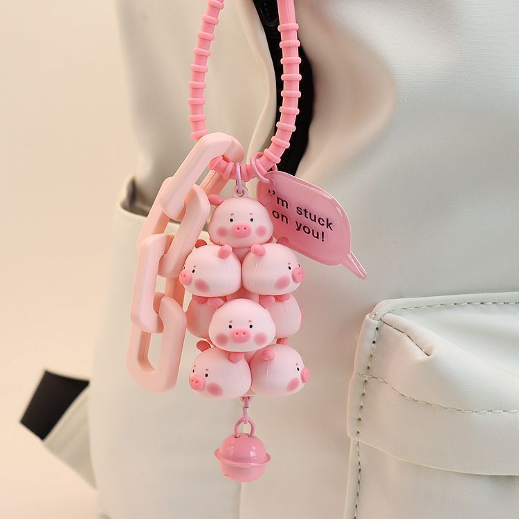 Wholesale Cute pet stacked pig cartoon doll creative anti-lost keychain student schoolbag pendant coles wholesale small gifts