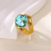 Wholesale Luxurious Vintage Large Imitation Pearl Women's Ring 18K Gold Plated Four-Leaf Clover Rotating Heart Blue Zircon Jewelry Ring
