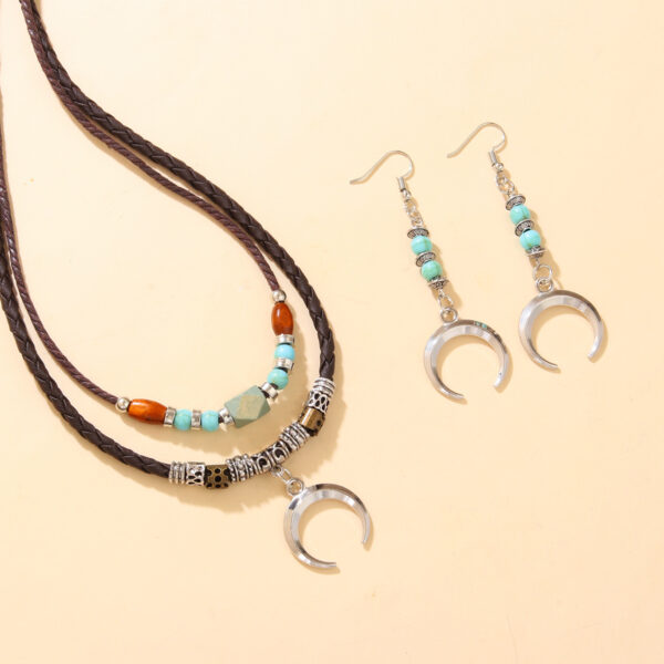 oly-354e10cc26b591adebc3436eae79f566 Wholesale Vintage alloy cross heart wolf tooth pendant beaded necklace