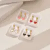 Wholesale 1 Pair Sweet Simple Style Heart Shape Enamel 201 Stainless Steel Ear Studs