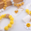 Wholesale New Cartoon sunflower love keychain pendant handmade beaded tassel silicone bracelet wrist keychain