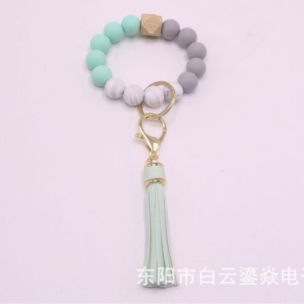 Wholesale Silicone leather tassel bracelet keychain