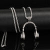 Wholesale Europe and the United States cross-border explosions rock music headphones pendant necklace jewelry men hip-hop titanium steel long sweater chain