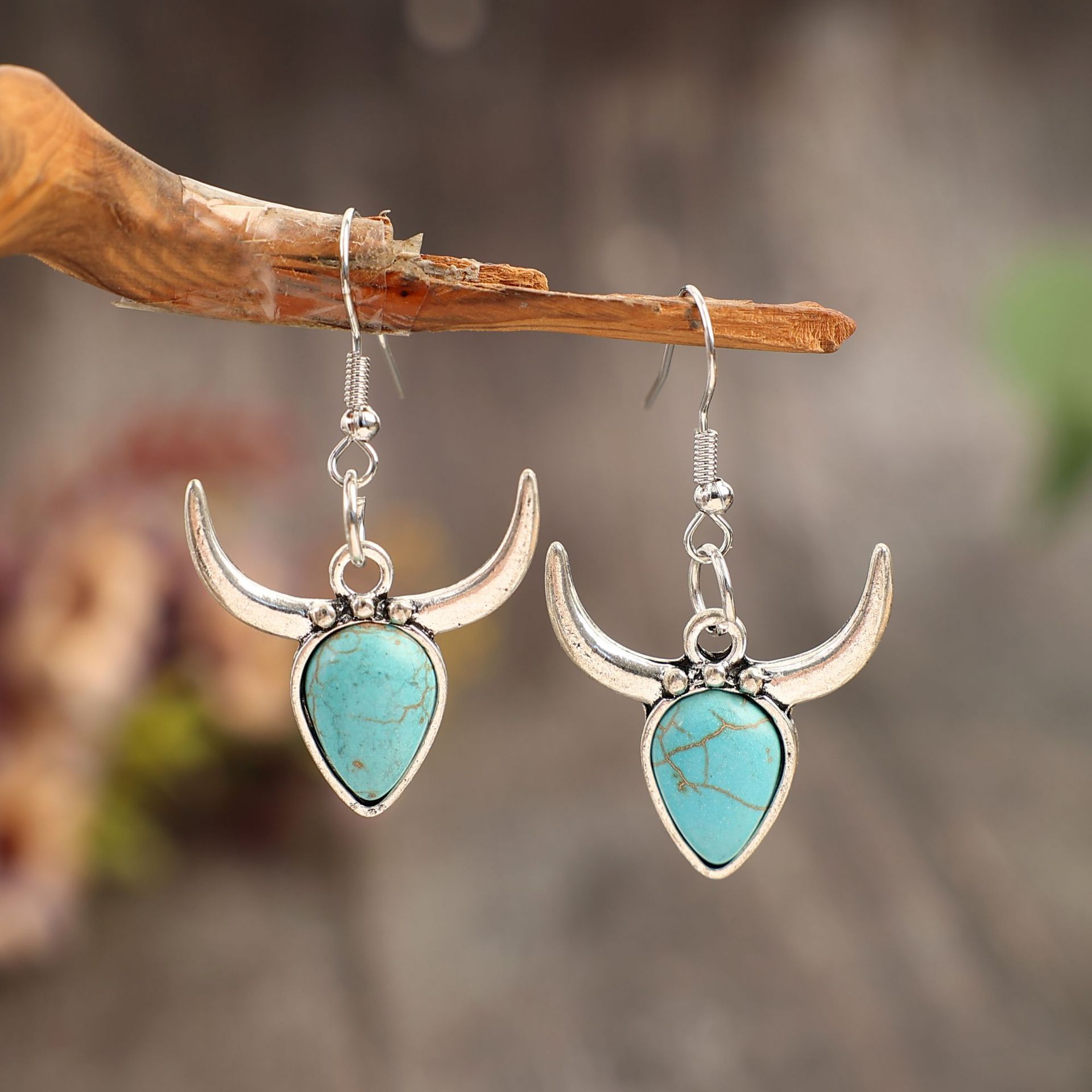 Wholesale New Retro Alloy Blue Turquoise Horn Earrings European and American Western Cowboy Creative Bull Head Earrings
