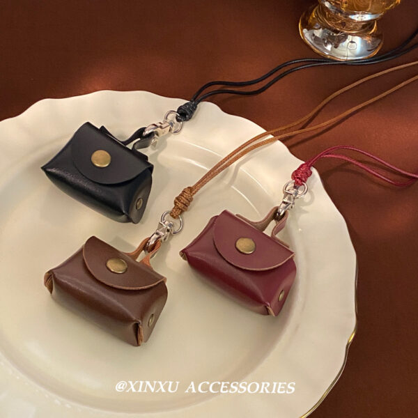 oly-386ec952569f72f69bcad10f90bf63bd Wholesale Vintage Cute Leather Coin Purse Neck Necklace 2024 New Autumn and Winter Design Sense Niche Long Woolen Chain