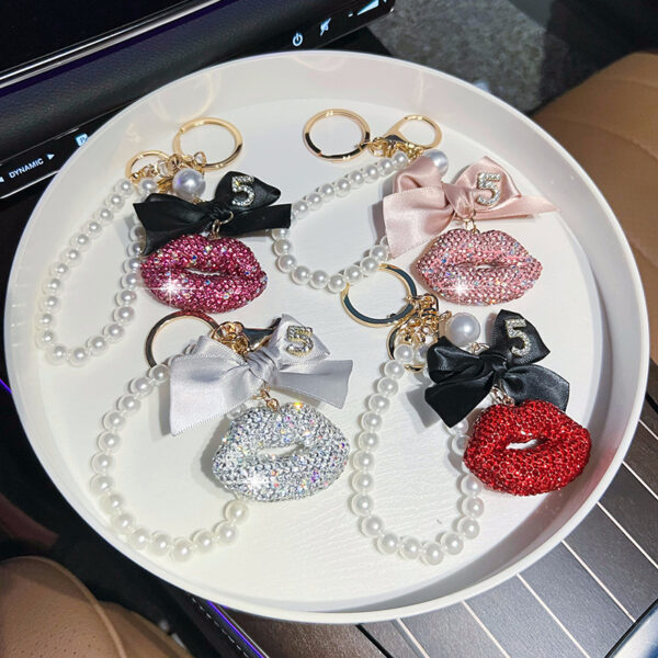 Wholesale New clay lips pearl chain car key chain pendant creative Korean bow bag ornaments women's cross-border