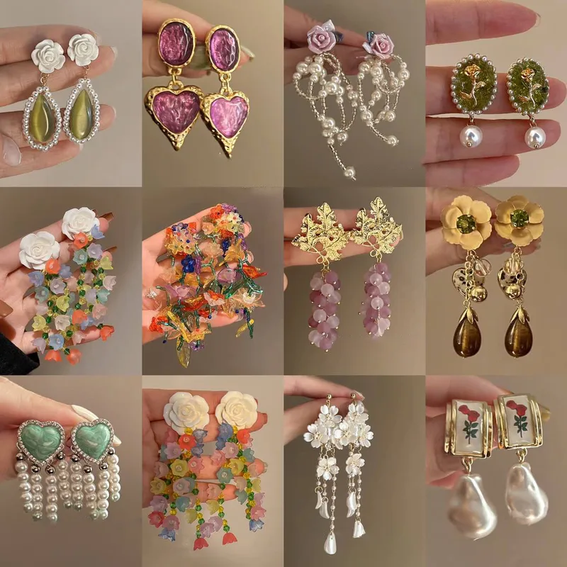 Wholesale 1 Pair Elegant Lady Sweet Geometric Heart Shape Bow Knot Inlay Alloy Artificial Pearls Zircon Earrings
