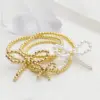 Wholesale Simple Style Classic Style Bow Knot Imitation Pearl Copper Wholesale Bracelets