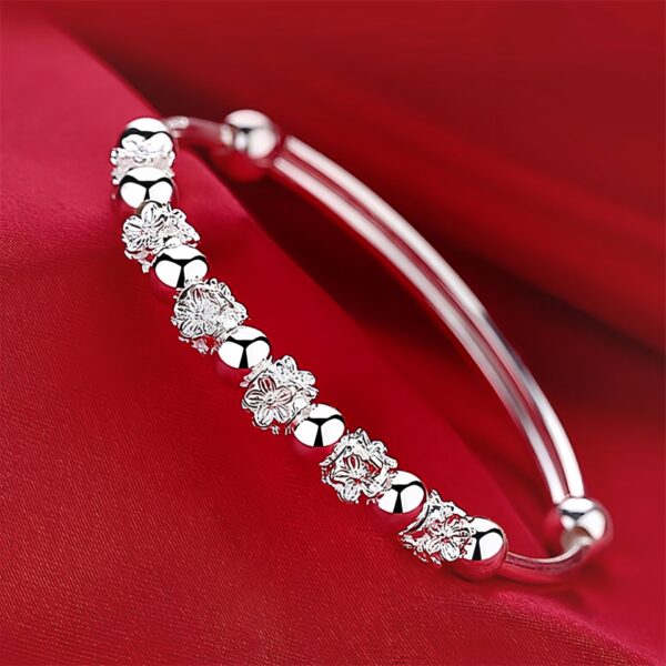 Wholesale Bloom plum rotating bead bracelet push-pull opening happy Bloom plum bracelet online celebrity fresh young Chinese Valentine's Day gift