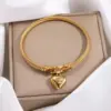 Wholesale Ion Plating (IP) Real Gold Plated Heart Shape 304 Stainless Steel Simple Style Waterproof Non Tarnish 304 Stainless Steel Bangle