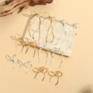 Wholesale 1 Pair Vintage Style Simple Style Commute Bow Knot Copper 14K Gold Plated Drop Earrings