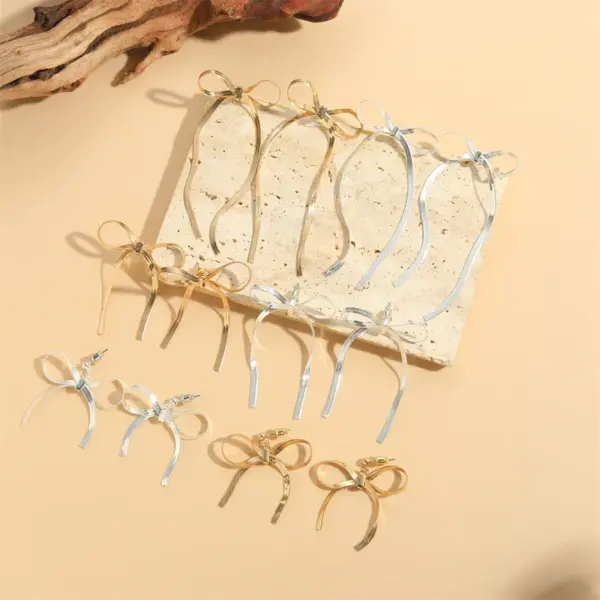 Wholesale 1 Pair Vintage Style Simple Style Commute Bow Knot Copper 14K Gold Plated Drop Earrings