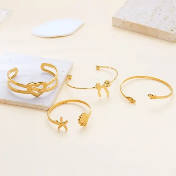 Wholesale 304 Stainless Steel Heart Shape Bow Knot PVD Coated Plated With KC Gold Modern Style Classic Style Commute Gold Bangle