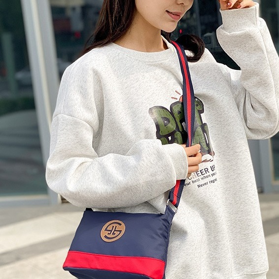 oly-3b5c3d61b4ee2690441f7406413c38b1 Wholesale Texted Crossbody Small Bag Nylon Multi-layer Shoulder Bag Casual Lightweight Mother's Wash Bag