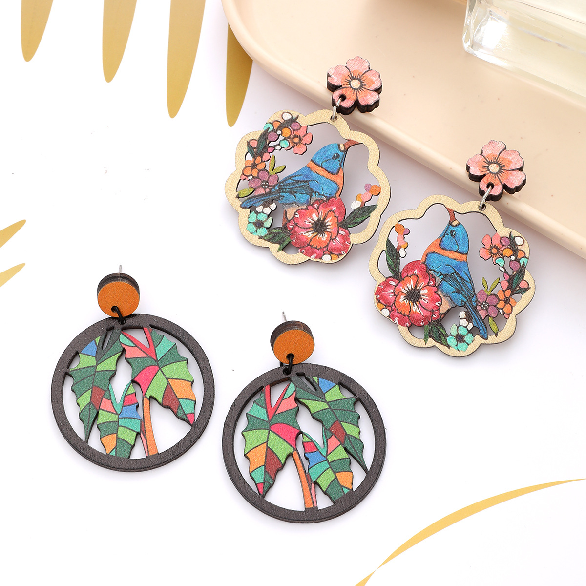 Wholesale New Bohemian Style nut Tree Flower Bird Hollow Earrings Love Earrings Personalized Fashionable European and American Earrings