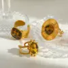 Wholesale 304 Stainless Steel Gold Plated Vacuum Electroplating (In Furnace) Gold Steel Color Round Sun Inlaid Women's Ring