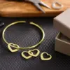 304 Stainless Steel Stainless Steel Heart Shape PVD Coated 18K Real Gold Plated Simple Style Commute Plating Bangle