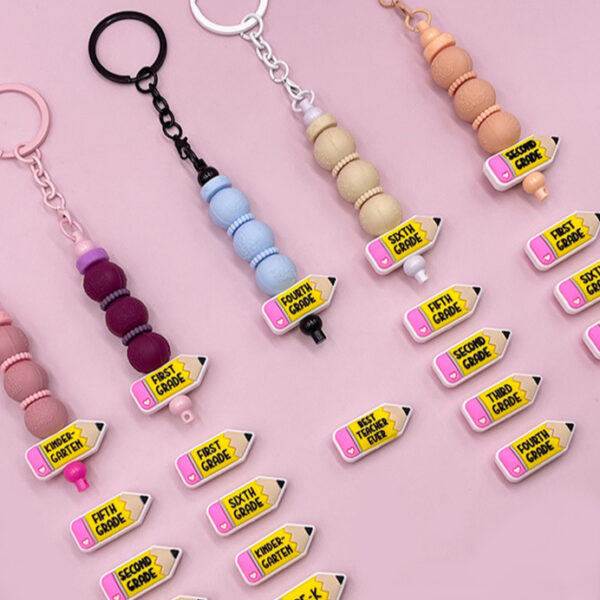 oly-3c9c52a9f353dbbdc9f98f4384264b0b Wholesale Factory direct sales of food-grade 3D silicone epoxy beads, creative pencil beads, cute cartoon insertable teething beads.