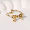 Wholesale Fashionable Small Exquisite Cute Sweet Design Open Stainless Steel Ring Bowknot Flower Shape Gold-plated Non-fading Ring Suitable For Daily Casual Dating