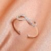 oly-3cf573ee53e9cb08249451db24061c23 Wholesale Women's hollow cross micro-paved zircon ring