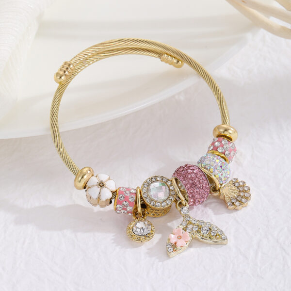 Wholesale European and American Hot Pandora Gold Stainless Steel Bracelet Women's Diamond-encrusted Fishtail Dolphin Alloy Pendant Adjustable Bracelet