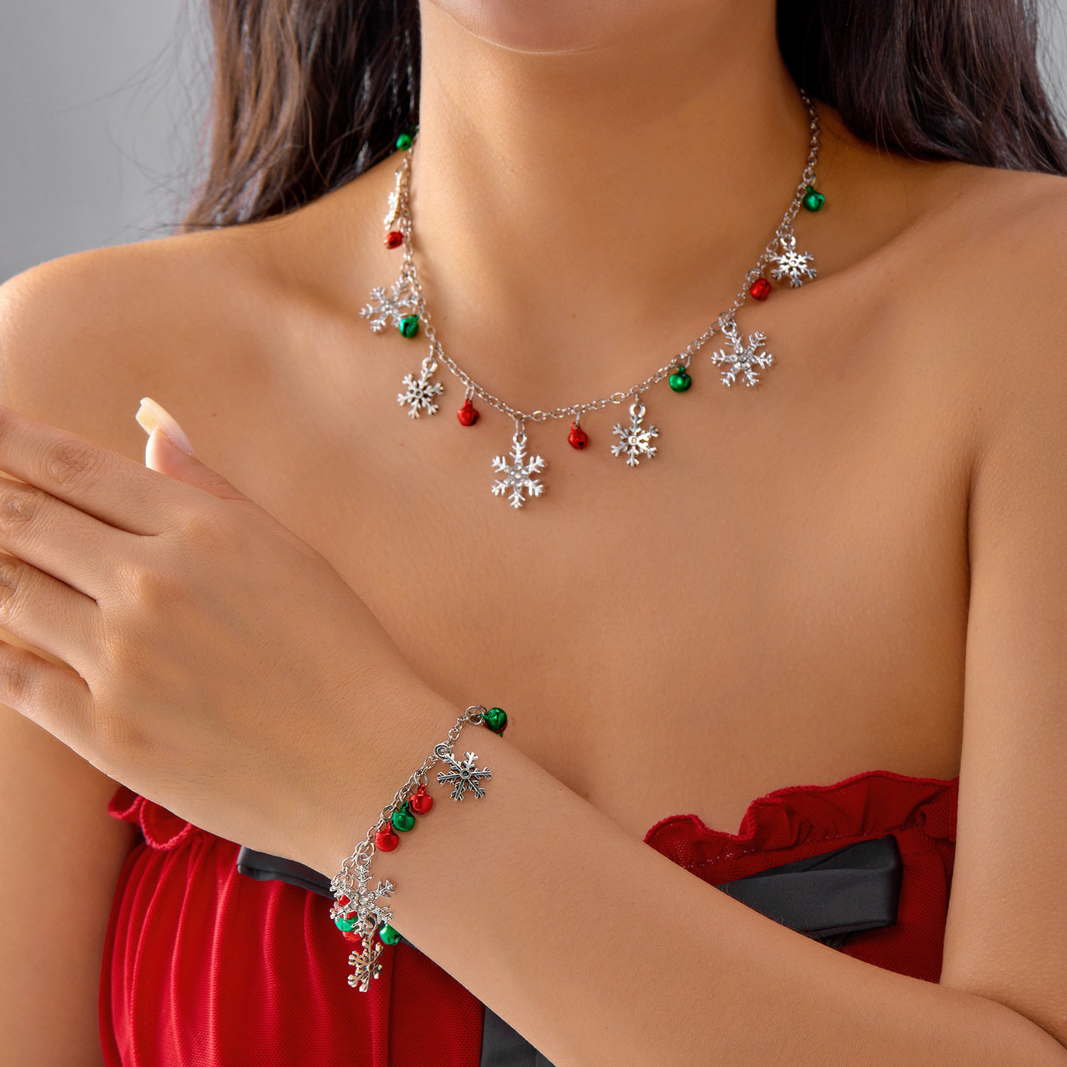 Wholesale New European and American cross-border Christmas jewelry set for women, featuring colorful bells, rhinestone-encrusted snowflakes, and penda