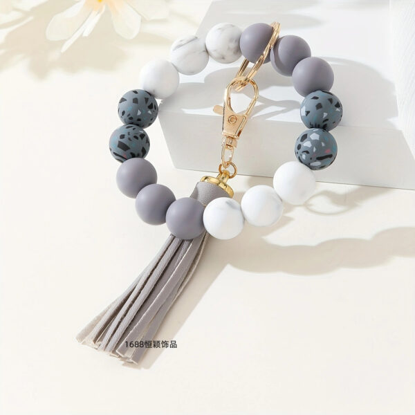 Wholesale Printed silicone bead bracelet keychain magic camouflage water turn silicone wrist bracelet key ring pendant