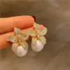 Wholesale 1 Pair Elegant Flower Plating Inlay Imitation Pearl Copper Zircon Earrings