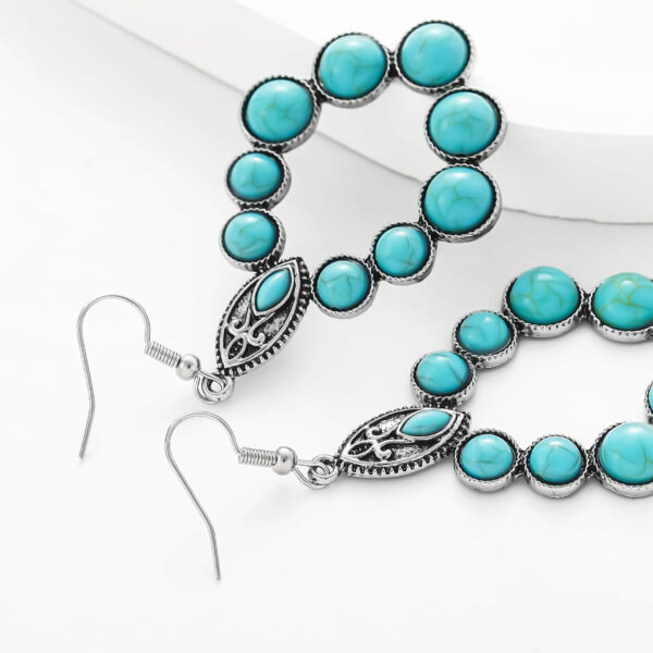 oly-3efc636b9a3fcecf7fd2332cc6d42985 Wholesale European and American New Retro Earrings Bohemian Turquoise Drop-Shaped Cut Out Earrings Earrings Factory Direct Sale