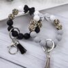 Wholesale in stock cross-border color bow leopard silicone beads beaded tassel bracelet bracelet keychain bag pendant
