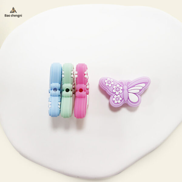 oly-3f7936c3e0cba899bd6983b48ed8993f Wholesale In stock silicone beads new epoxy butterfly loose beads baby teether anti-drop chain accessories DIY beads