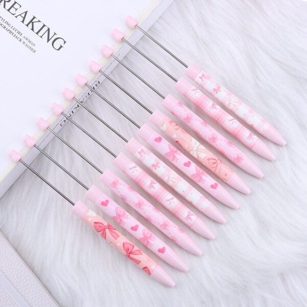 oly-40415b53c594888961dbc473df1d3cc7 Wholesale DIY long printed beaded pen with pink bow pattern